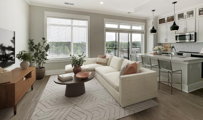 a living room with a couch and a tv