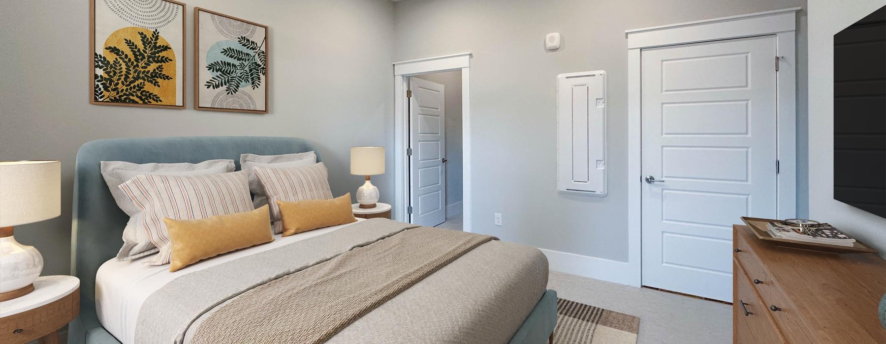 a bedroom with a bed and a fan