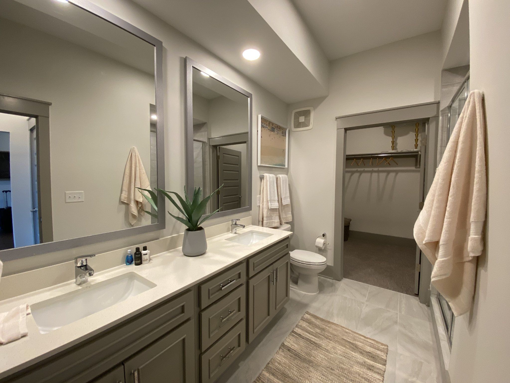 The Preserve at Westfields apartments bathroom with walk-in closet.